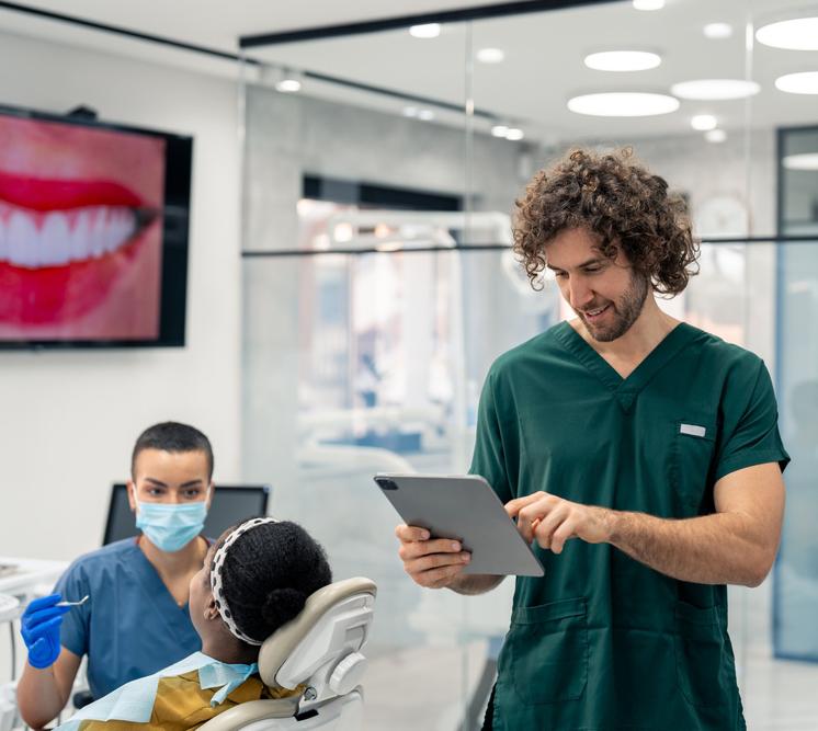 Dentist in office working on patient